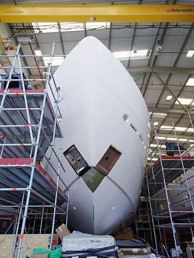 a space shuttle in a warehouse aboard THE BOAT OF FATE 2 Yacht for Sale