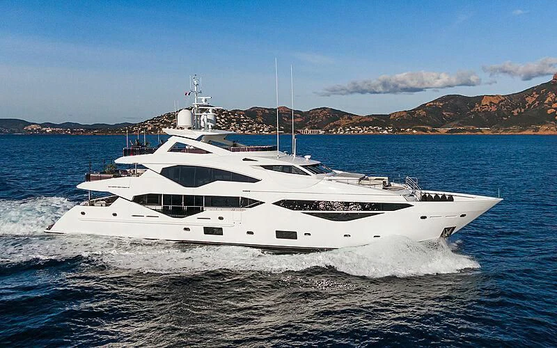 a white yacht on the water aboard THE BOAT OF FATE 2 Yacht for Sale