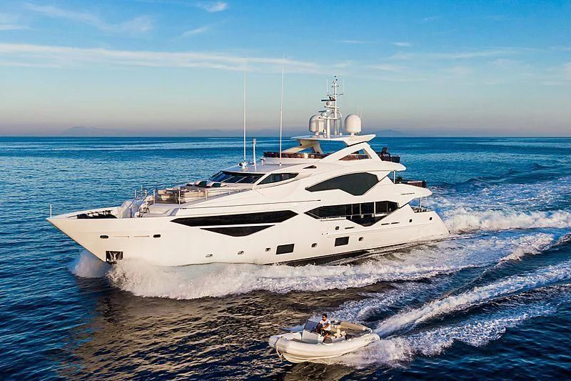 a white yacht on the water aboard THE BOAT OF FATE 2 Yacht for Sale