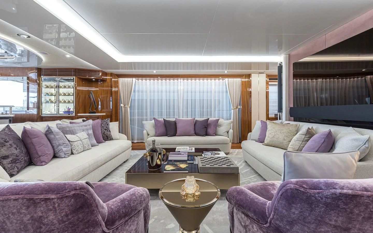 a living room with a couch and a coffee table aboard THE BOAT OF FATE 2 Yacht for Sale