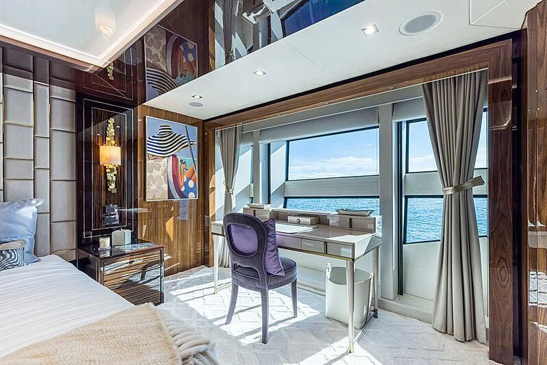 a room with a bed and a desk aboard THE BOAT OF FATE 2 Yacht for Sale