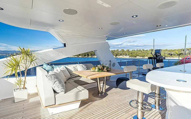 a room with a couch and a table and a pool aboard THE BOAT OF FATE 2 Yacht for Sale