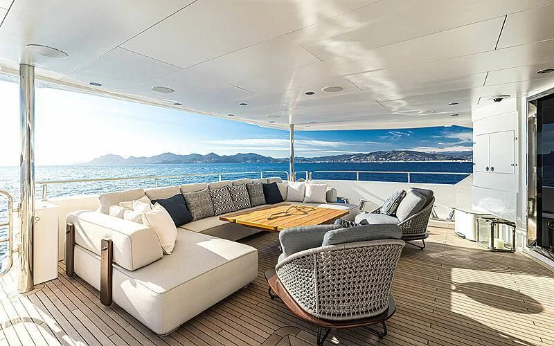 a living room with a large patio aboard THE BOAT OF FATE 2 Yacht for Sale