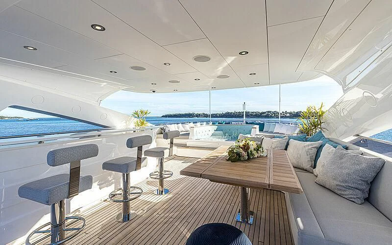 a room with a table and chairs aboard THE BOAT OF FATE 2 Yacht for Sale