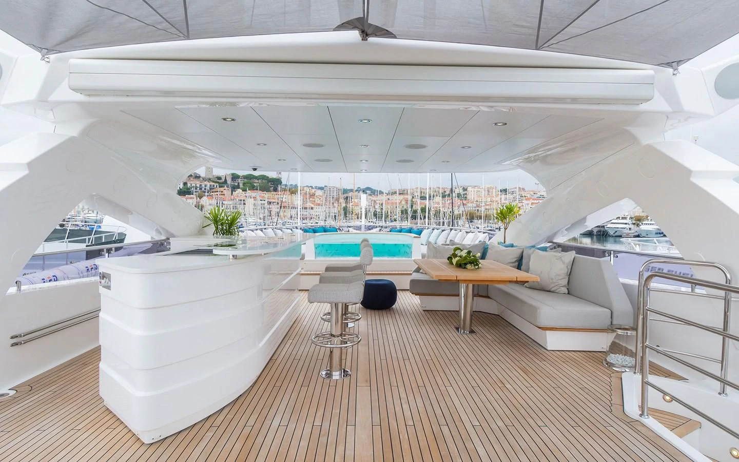 a large room with a pool table and chairs aboard THE BOAT OF FATE 2 Yacht for Sale