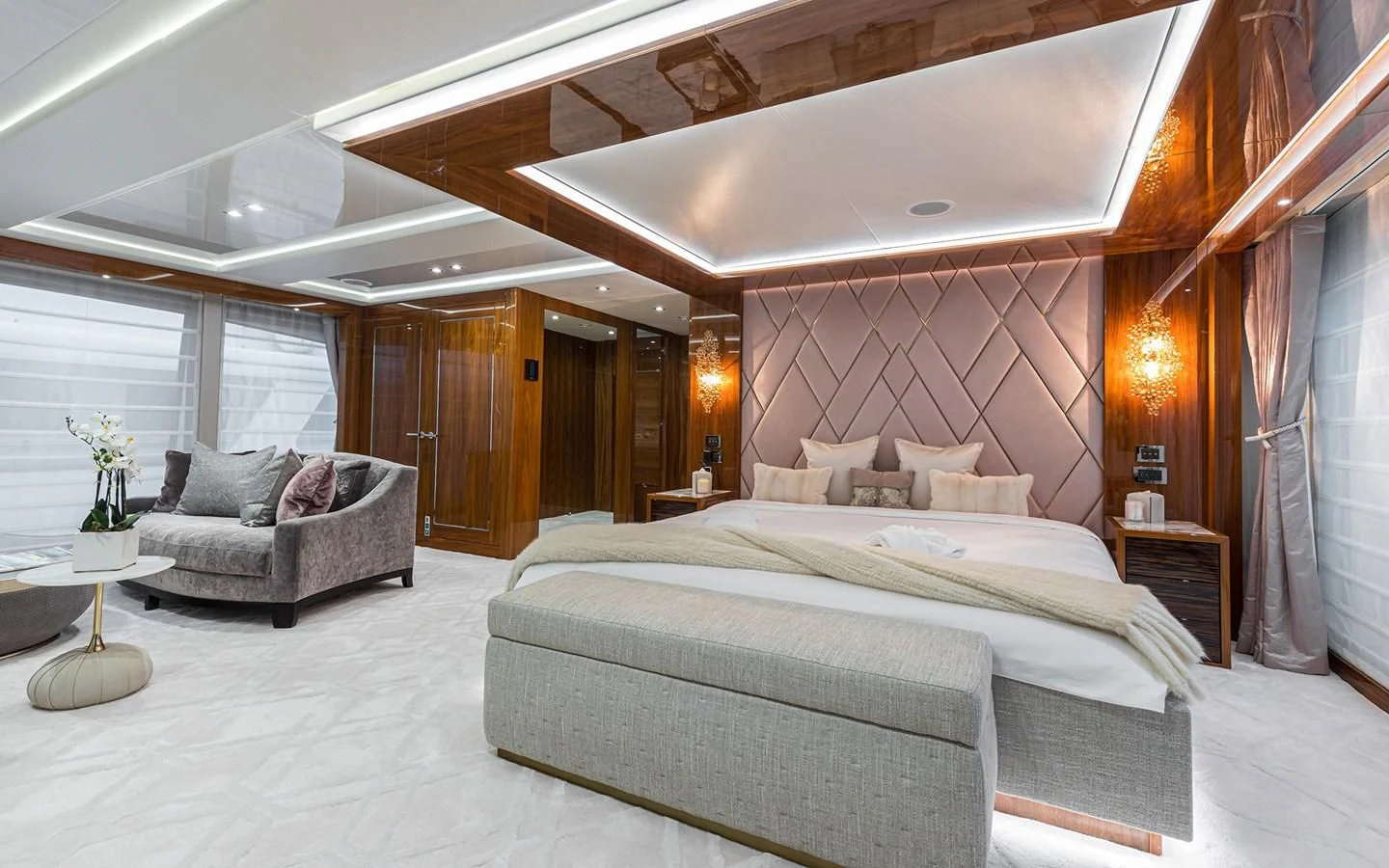 a large bedroom with a bed and a couch aboard THE BOAT OF FATE 2 Yacht for Sale