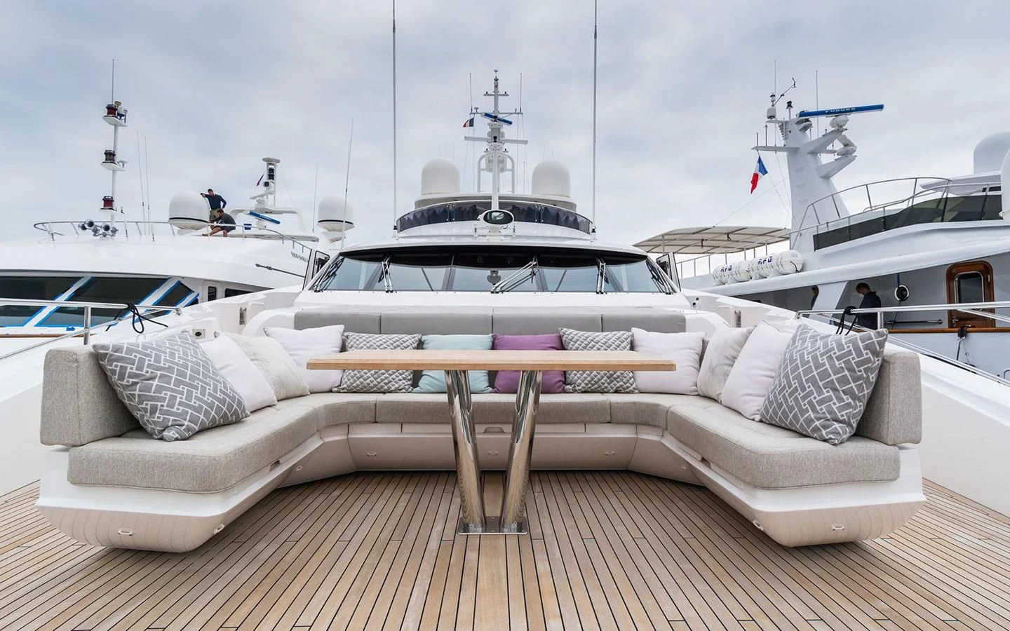 a white couch in front of a white boat aboard THE BOAT OF FATE 2 Yacht for Sale