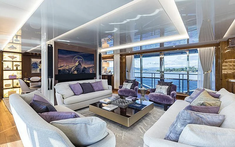 a living room with a large window aboard THE BOAT OF FATE 2 Yacht for Sale