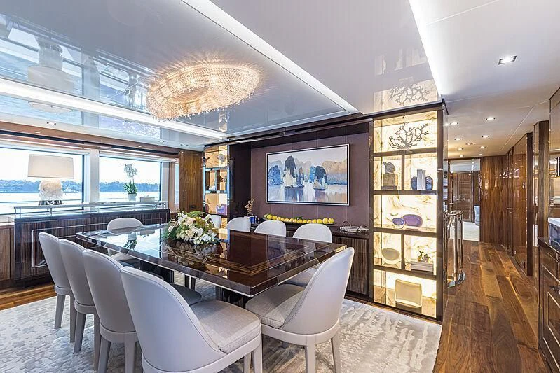 a large dining room with a large table and chairs aboard THE BOAT OF FATE 2 Yacht for Sale