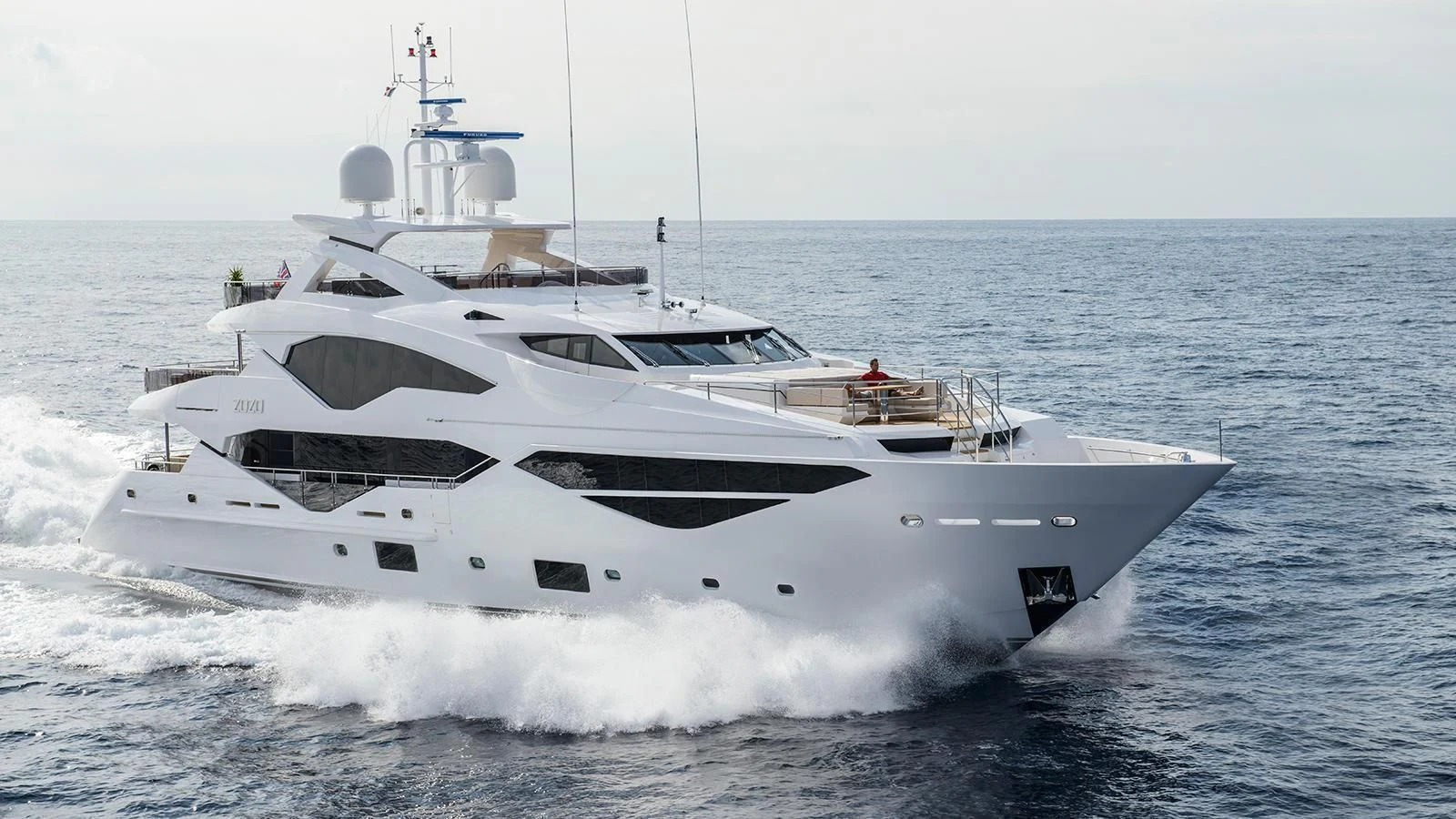 a white yacht on the water aboard THE BOAT OF FATE 2 Yacht for Sale