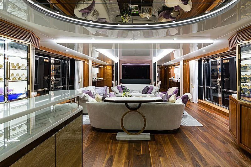 a living room with a large window aboard THE BOAT OF FATE 2 Yacht for Sale