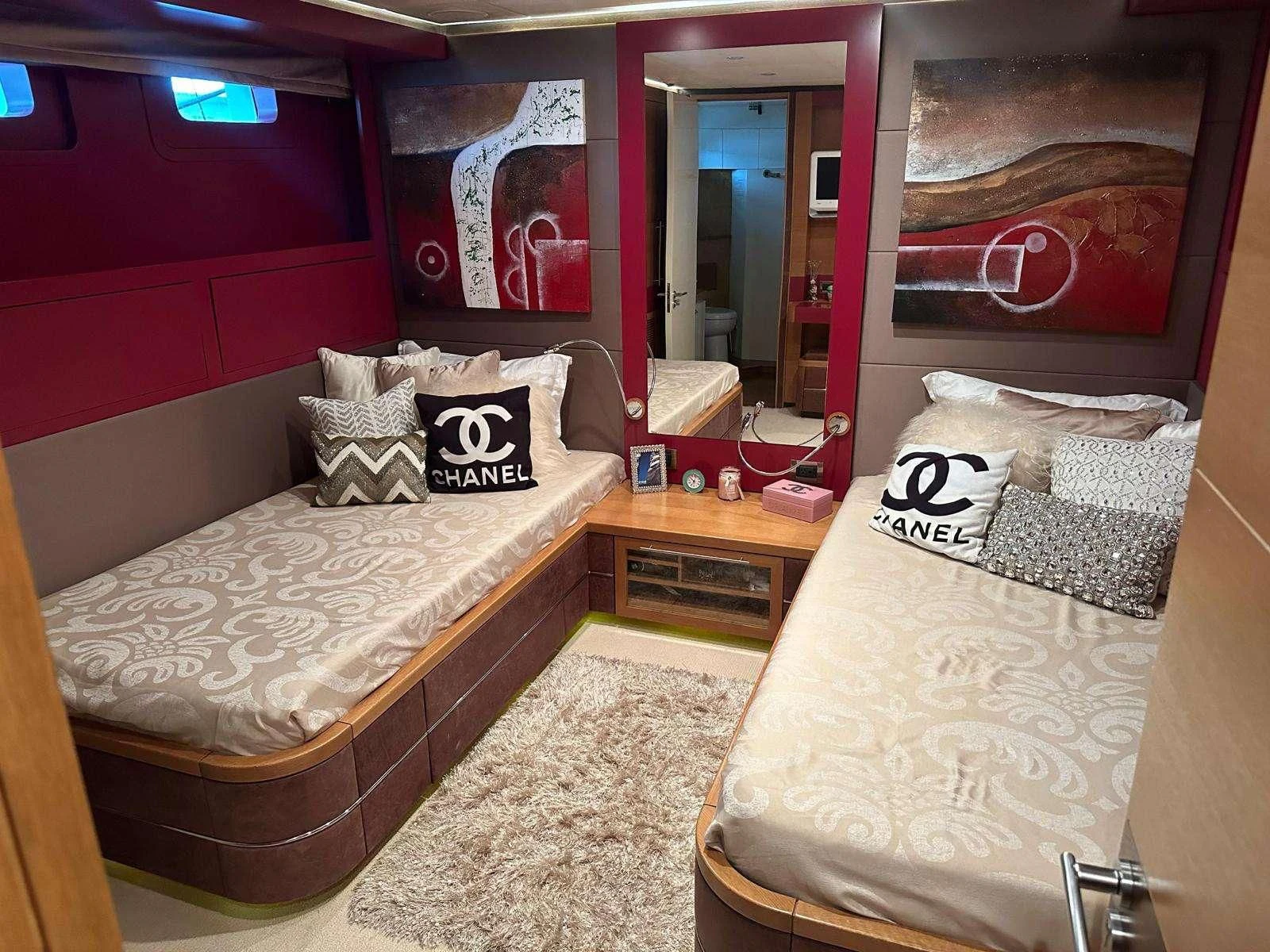 a room with two beds aboard KIMBERLIE Yacht for Sale