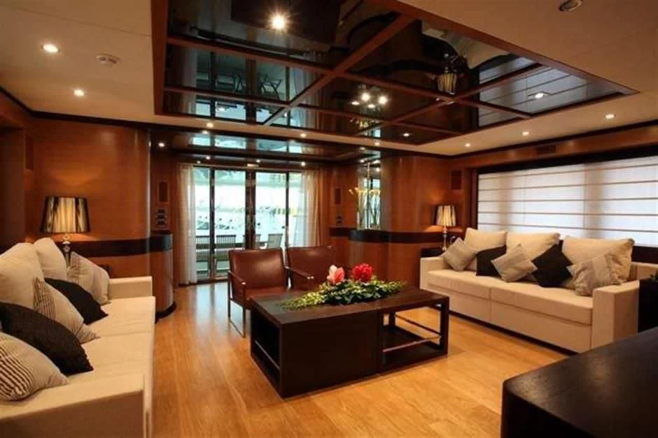 a living room with a large glass ceiling aboard KIMBERLIE Yacht for Sale