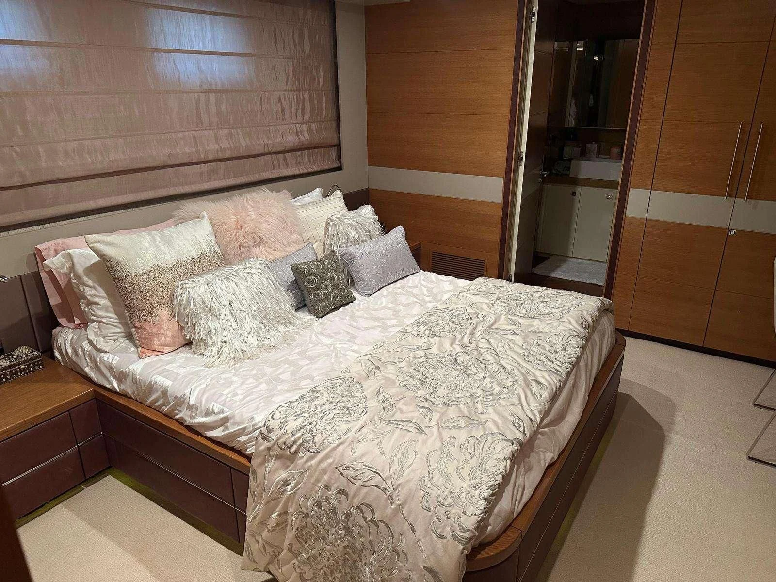 a bed with pillows on it aboard KIMBERLIE Yacht for Sale
