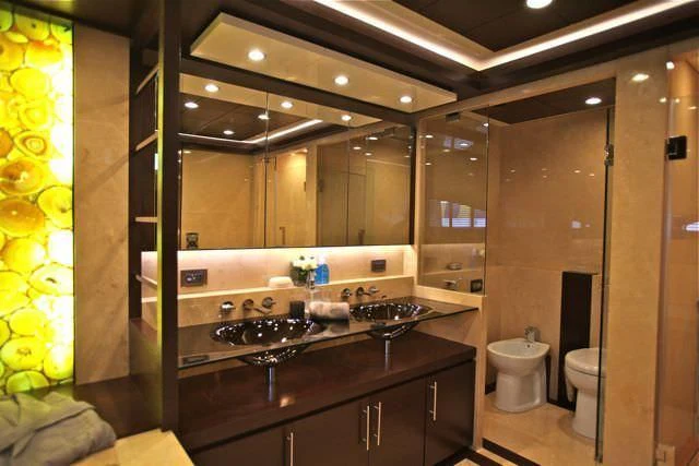 a bathroom with a glass shower aboard KIMBERLIE Yacht for Sale