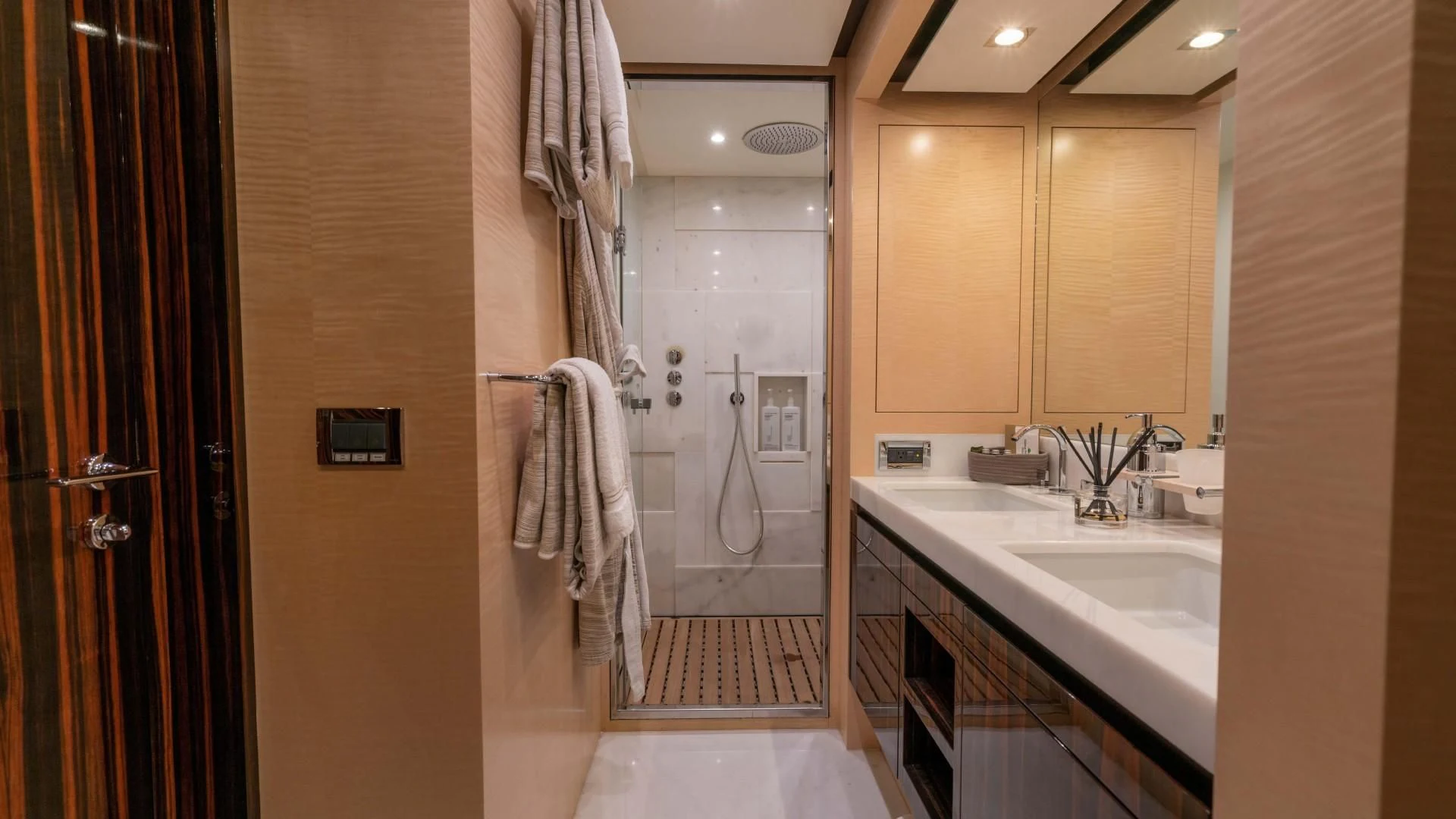 a bathroom with a sink and a shower aboard PHOENIX Yacht for Sale
