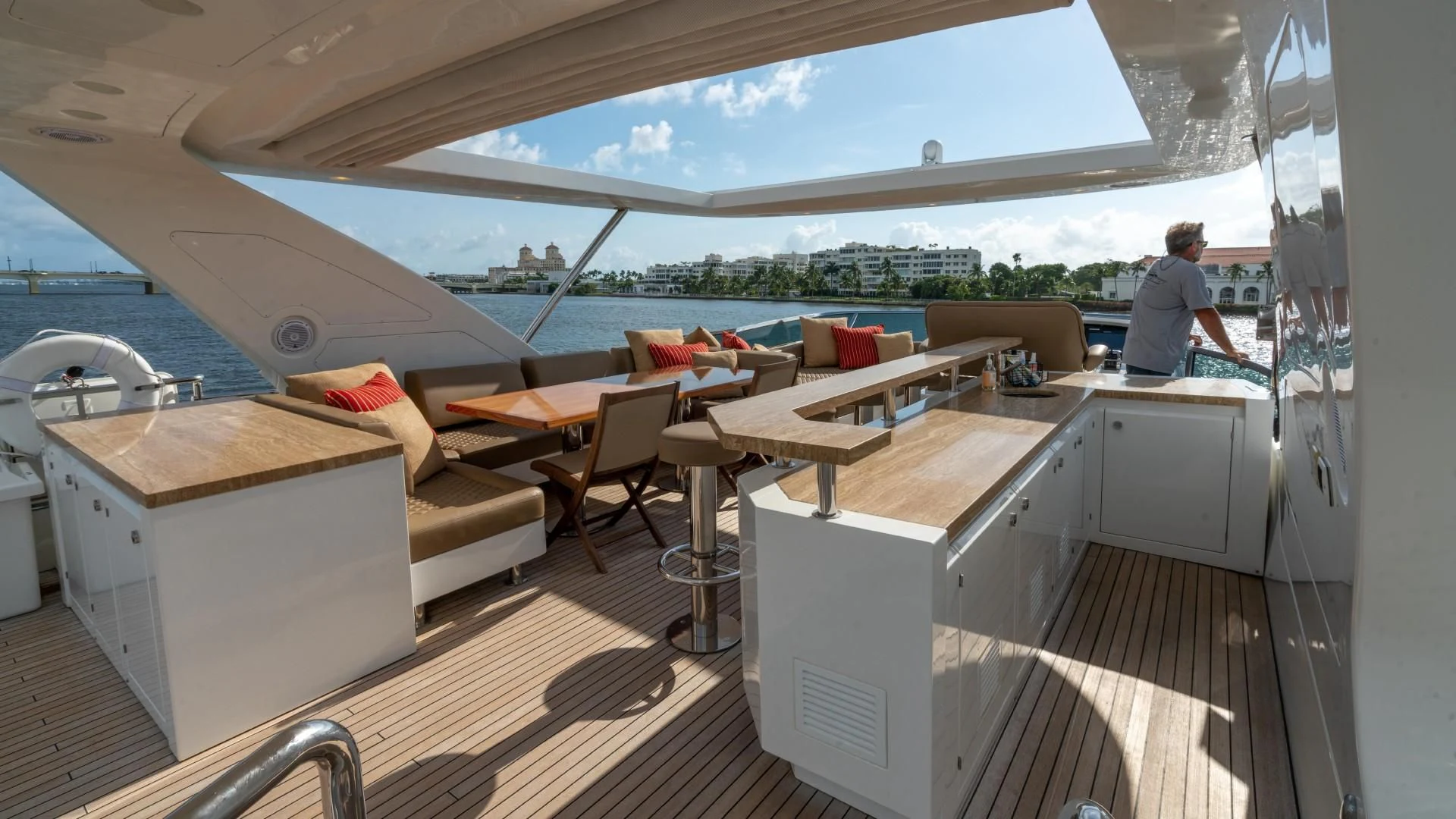 a room with a couch and a table aboard PHOENIX Yacht for Sale