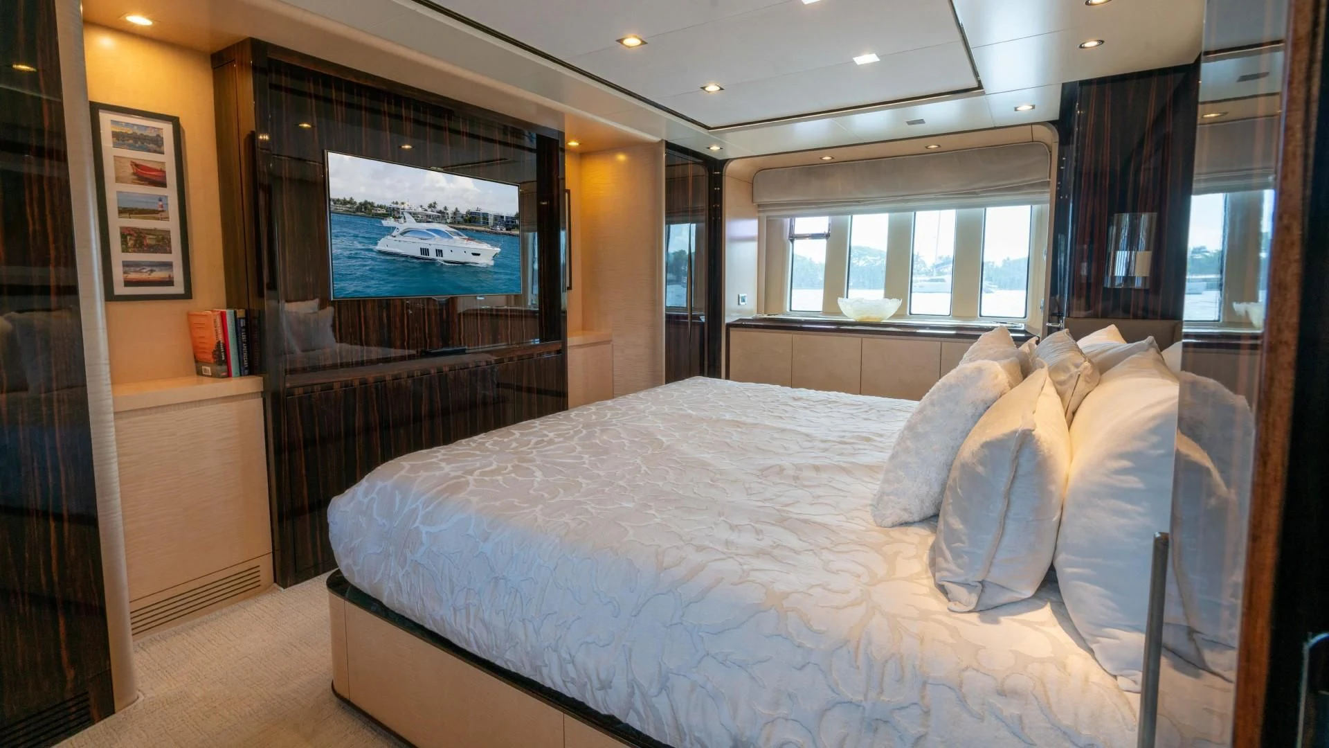 a bed in a room aboard PHOENIX Yacht for Sale