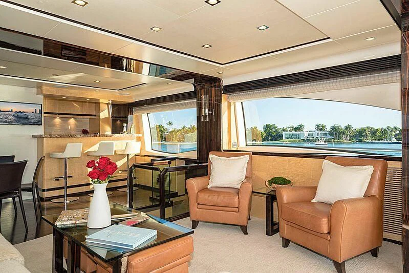 a living room with a large window aboard PHOENIX Yacht for Sale