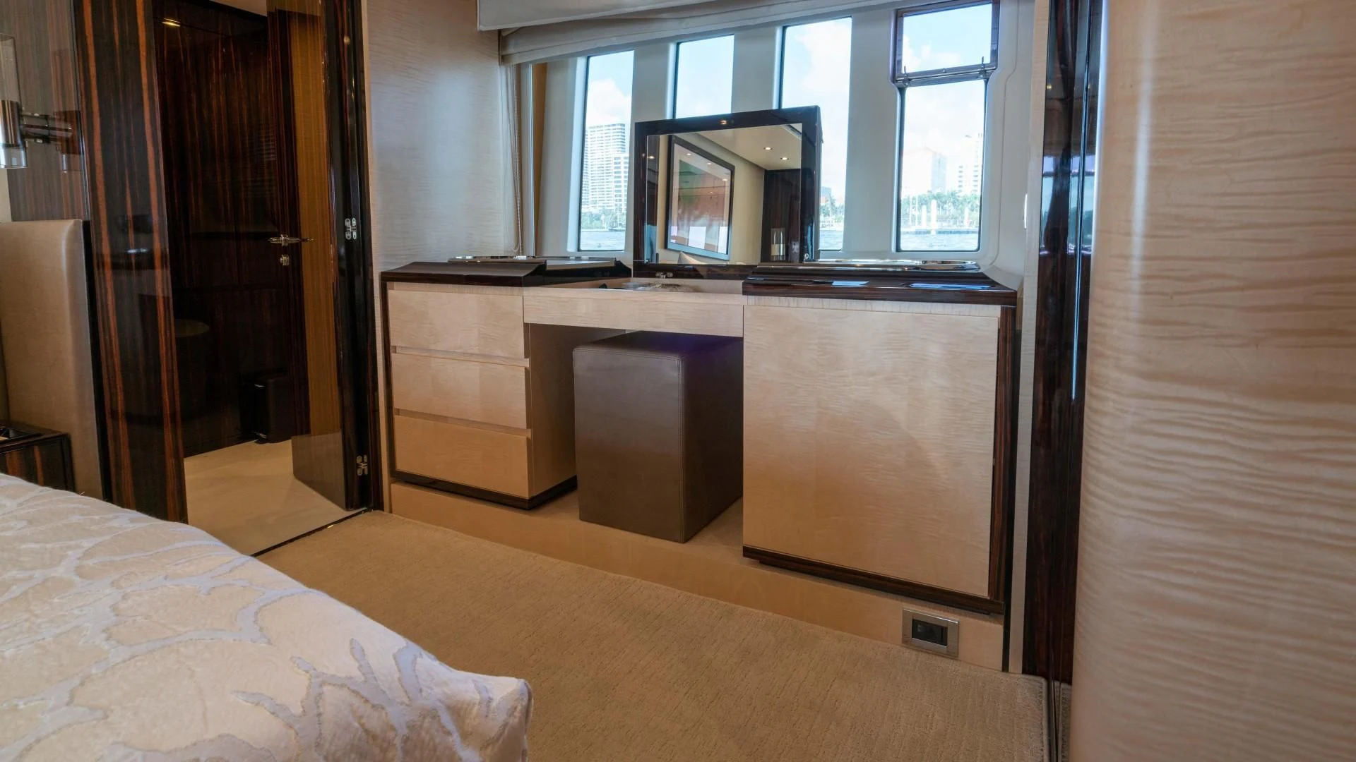 a room with a bed and a desk aboard PHOENIX Yacht for Sale