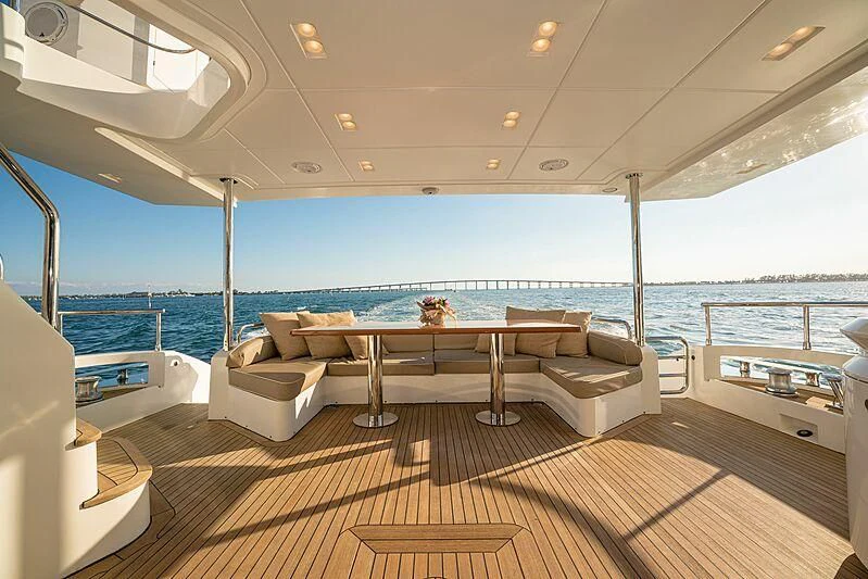 a large living room with a large body of water aboard PHOENIX Yacht for Sale