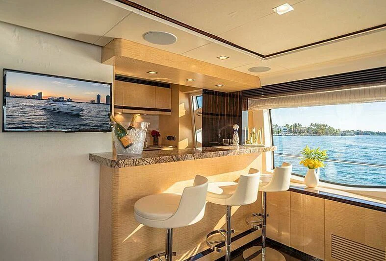 a kitchen with a large window aboard PHOENIX Yacht for Sale