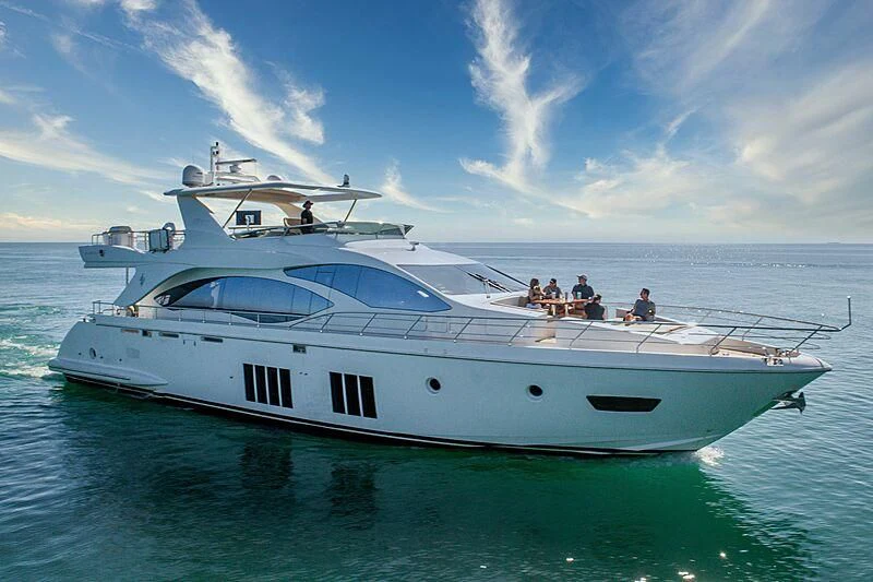 a white yacht in the water aboard PHOENIX Yacht for Sale