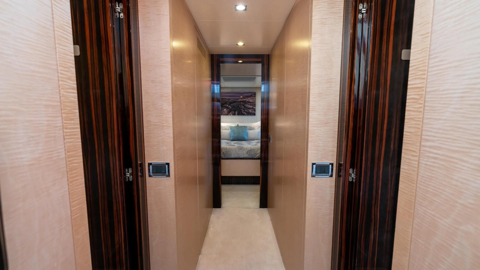 a hallway with doors aboard PHOENIX Yacht for Sale