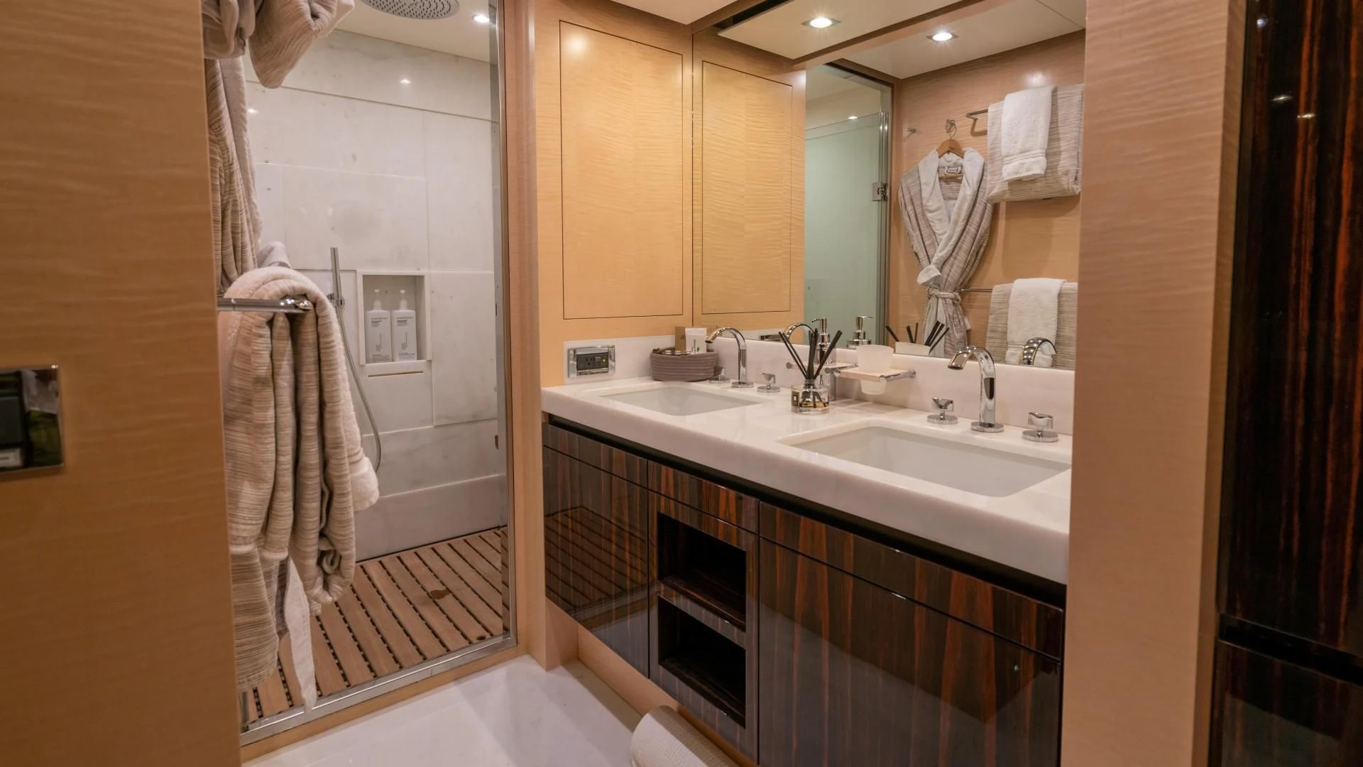 a bathroom with a large mirror aboard PHOENIX Yacht for Sale