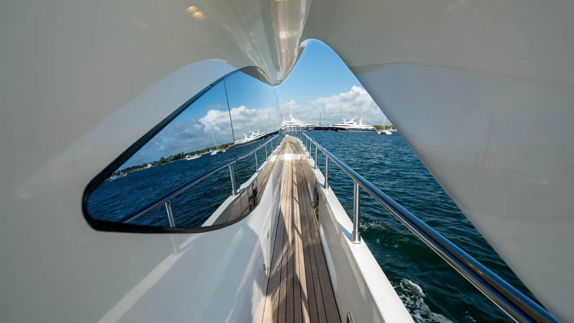 a large ship in the water aboard PHOENIX Yacht for Sale
