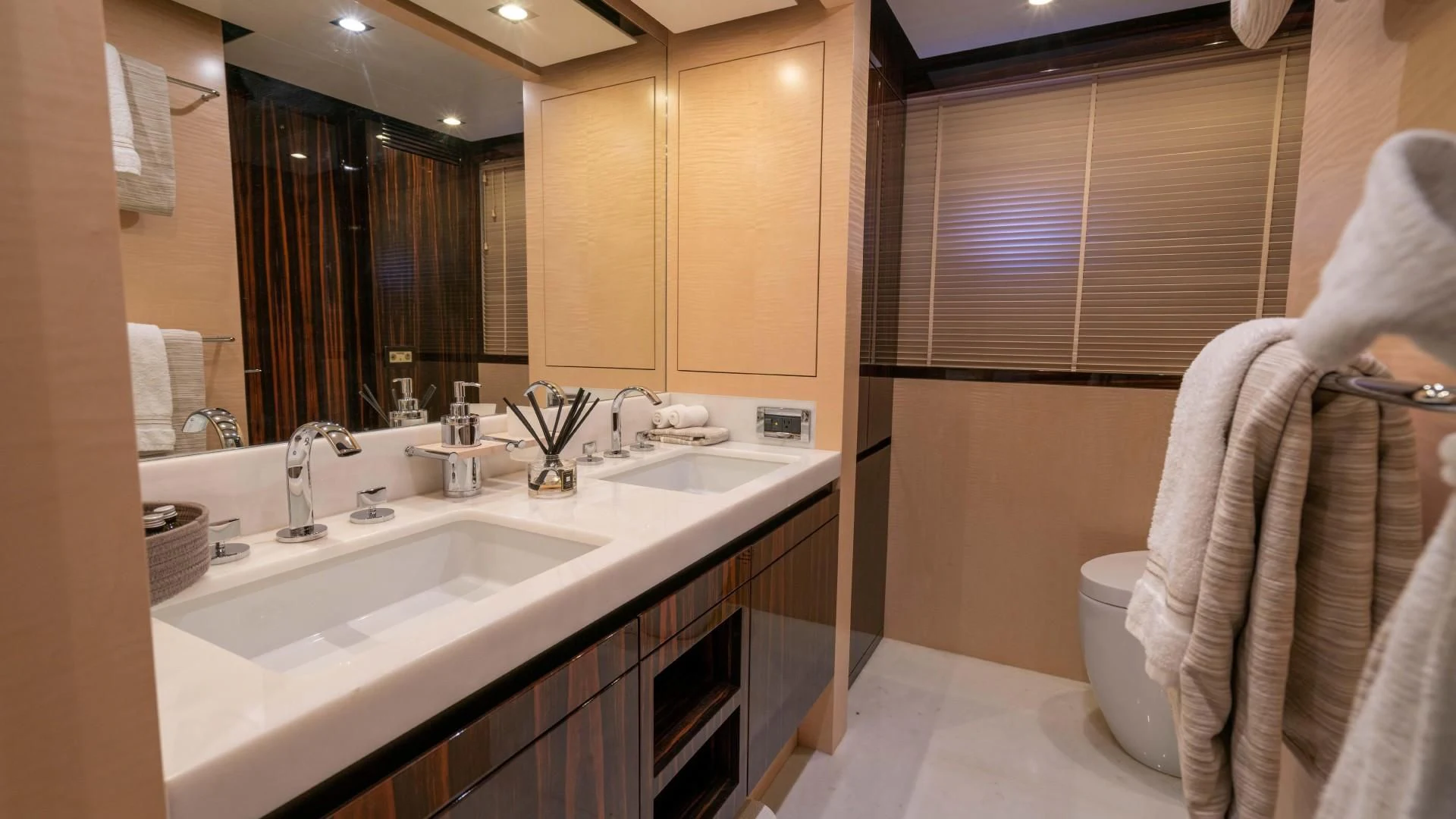 a bathroom with a large mirror aboard PHOENIX Yacht for Sale