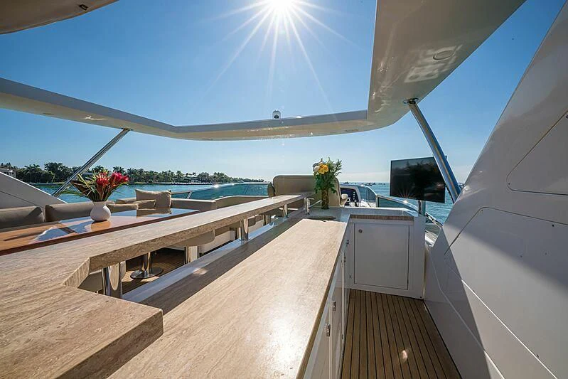 a room with a pool and a deck aboard PHOENIX Yacht for Sale