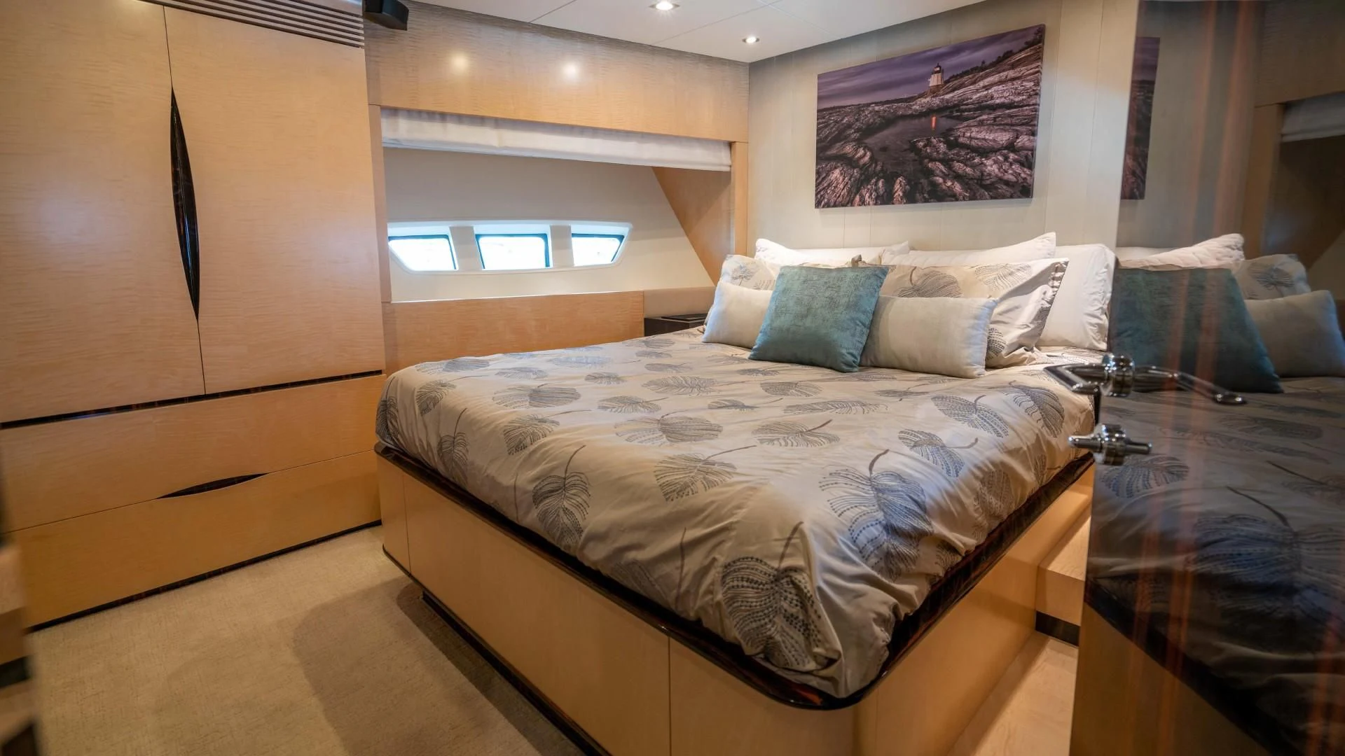 a room with a bed and a window aboard PHOENIX Yacht for Sale