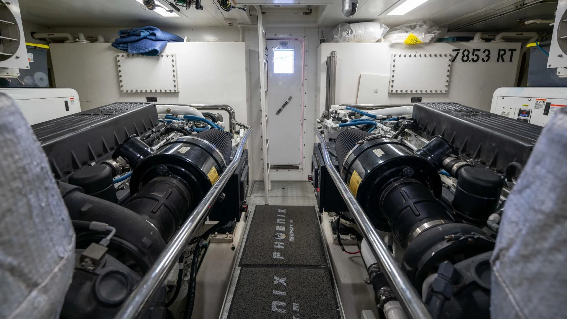 a room with a large group of black and silver machinery aboard PHOENIX Yacht for Sale