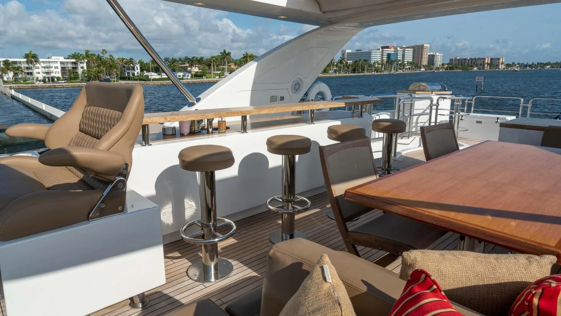 a table and chairs on a boat aboard PHOENIX Yacht for Sale