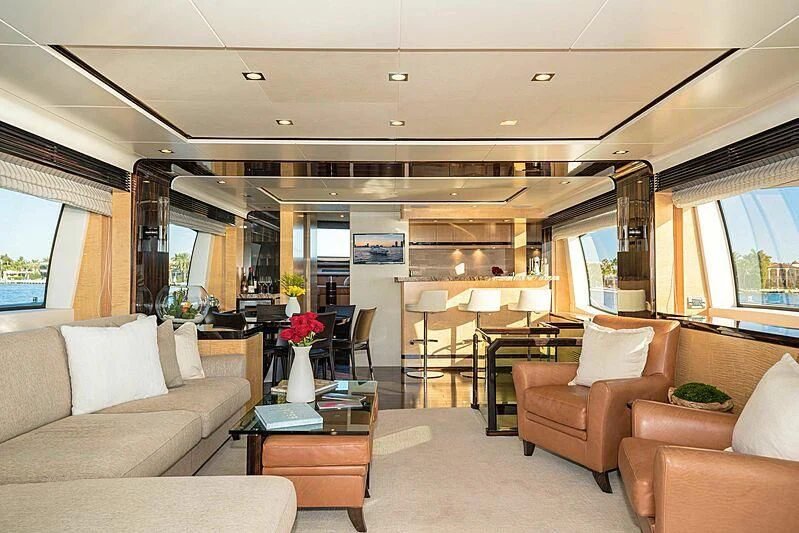 a living room with a large window aboard PHOENIX Yacht for Sale