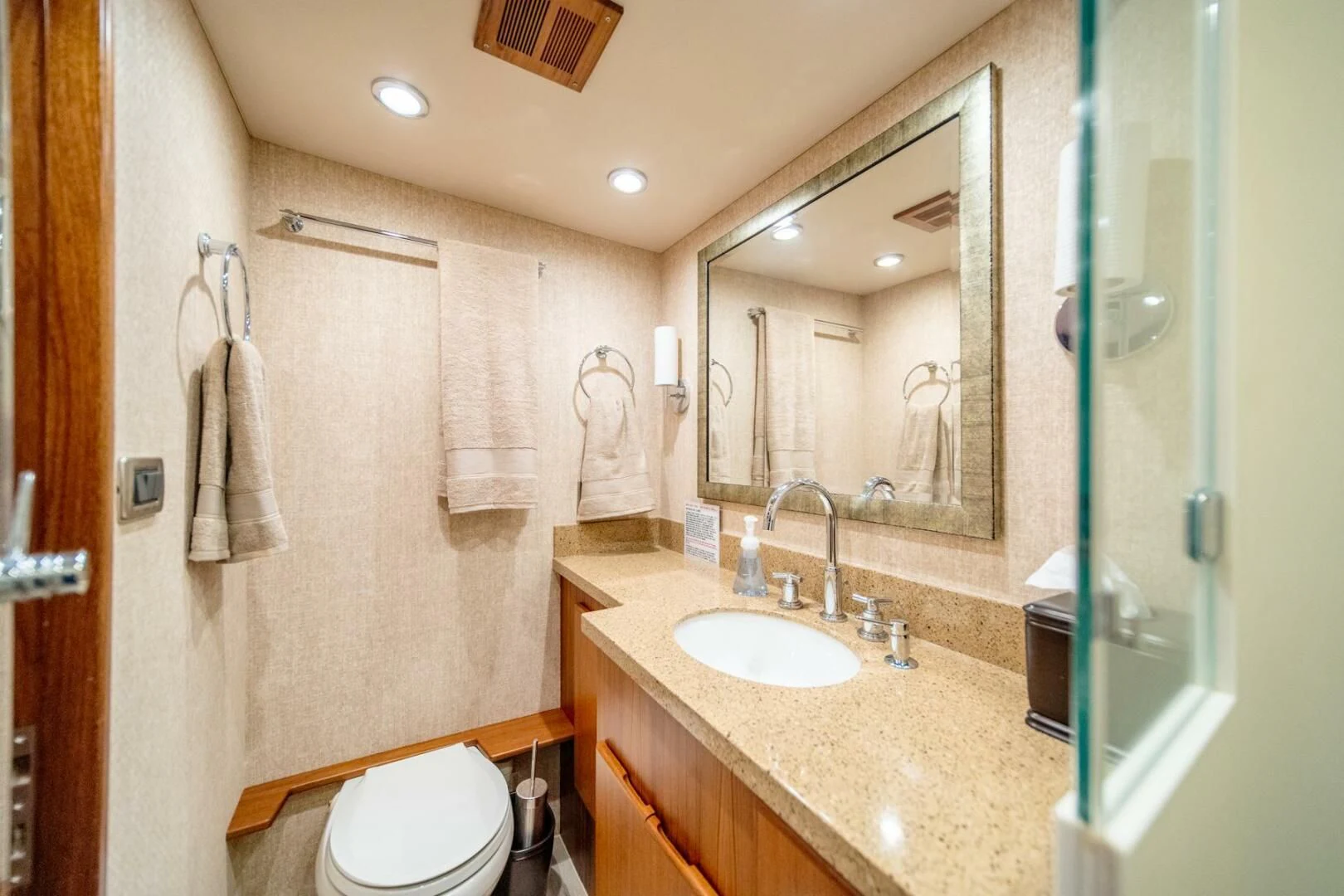 a bathroom with a sink and a mirror aboard SEA LION Yacht for Sale
