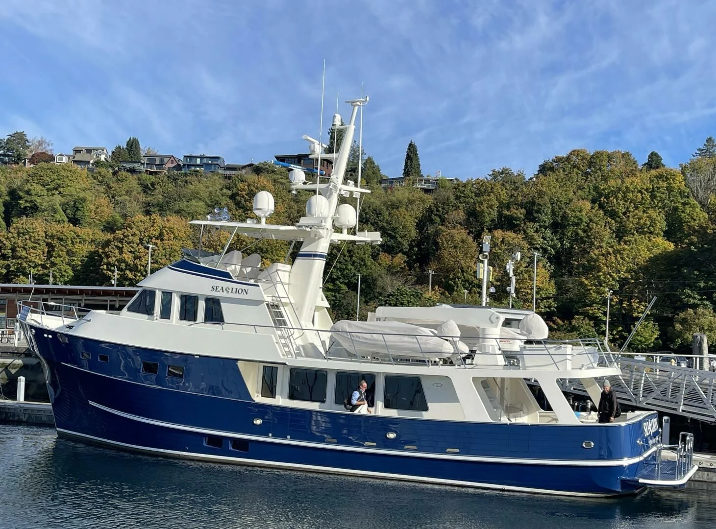 a large boat in the water aboard SEA LION Yacht for Sale