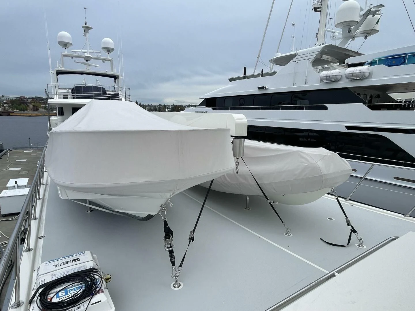 a white boat with a white sail aboard SEA LION Yacht for Sale