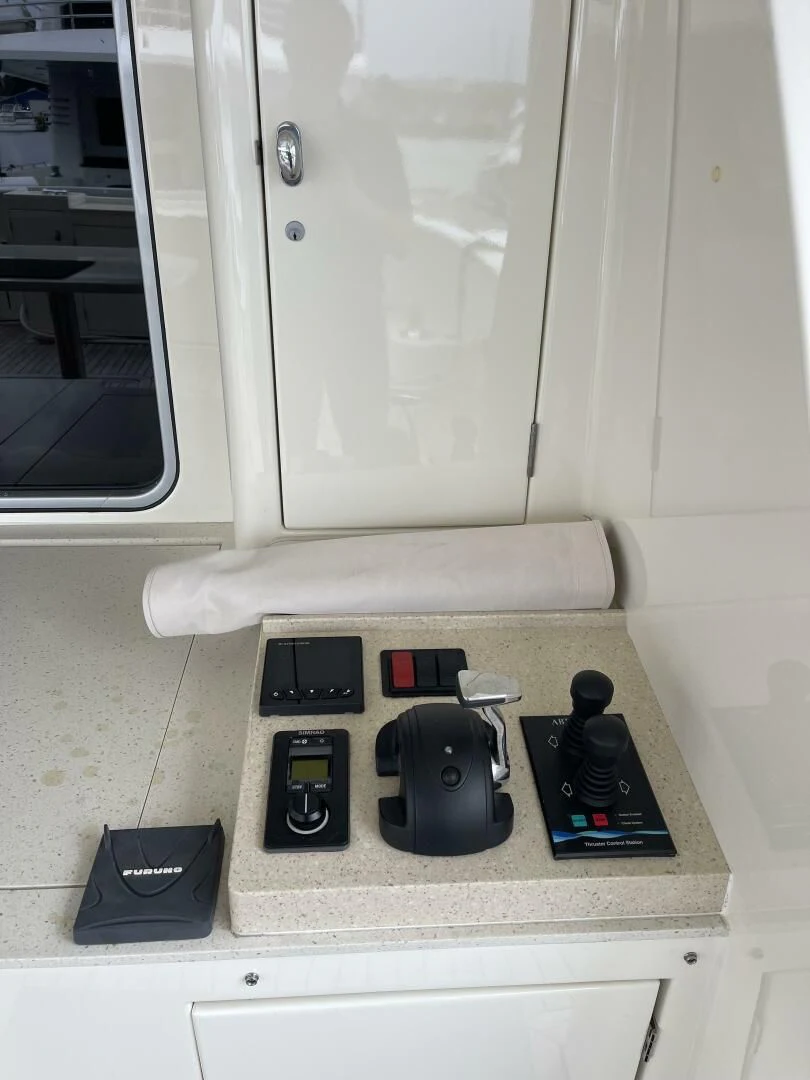 a group of objects on a counter aboard SEA LION Yacht for Sale