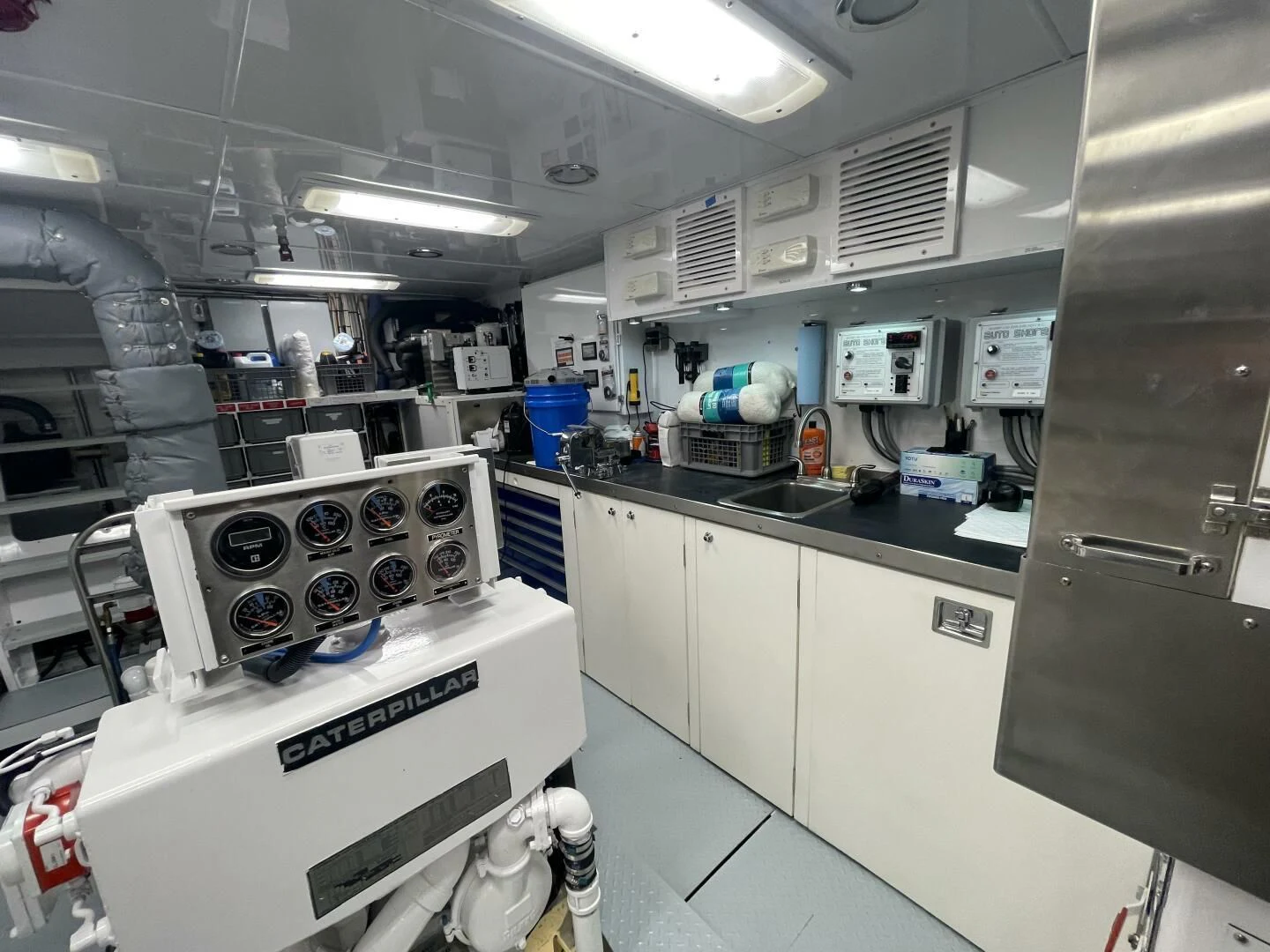 a kitchen with a lot of equipment aboard SEA LION Yacht for Sale
