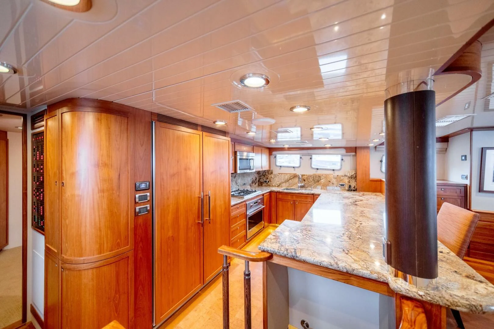 a large kitchen with a large island aboard SEA LION Yacht for Sale