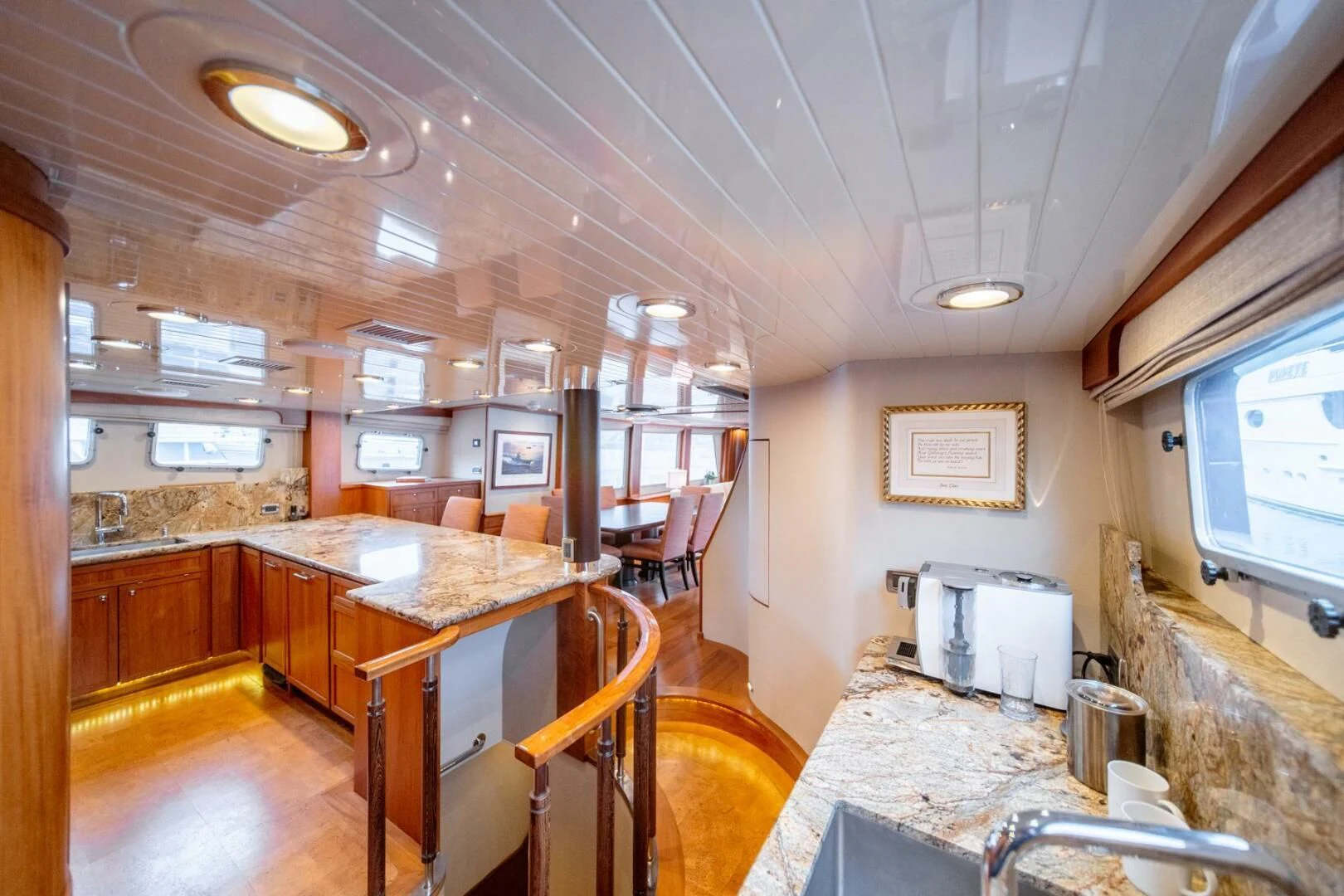 a kitchen with a bar and a bar aboard SEA LION Yacht for Sale