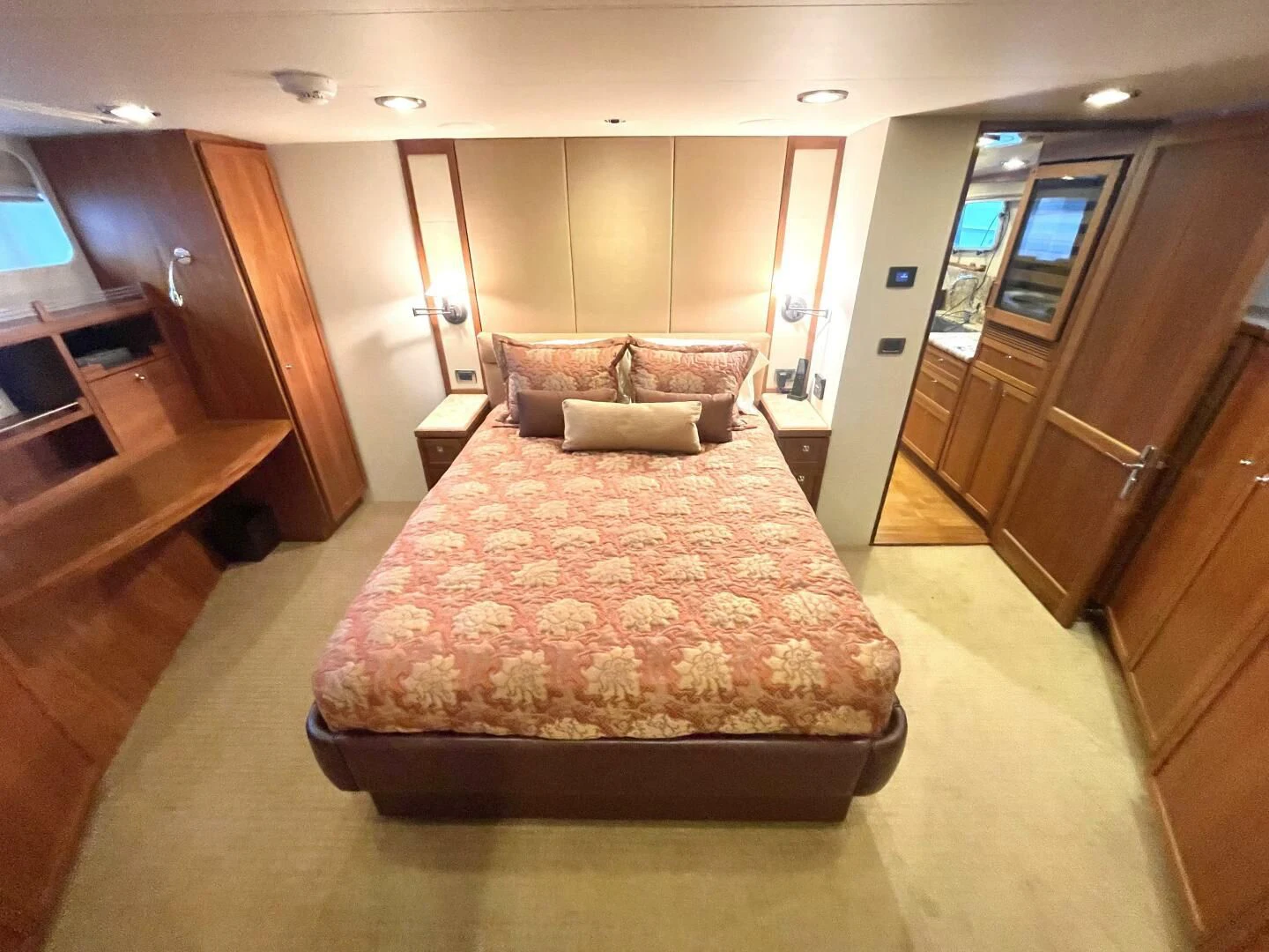 a large bedroom with a large bed aboard SEA LION Yacht for Sale