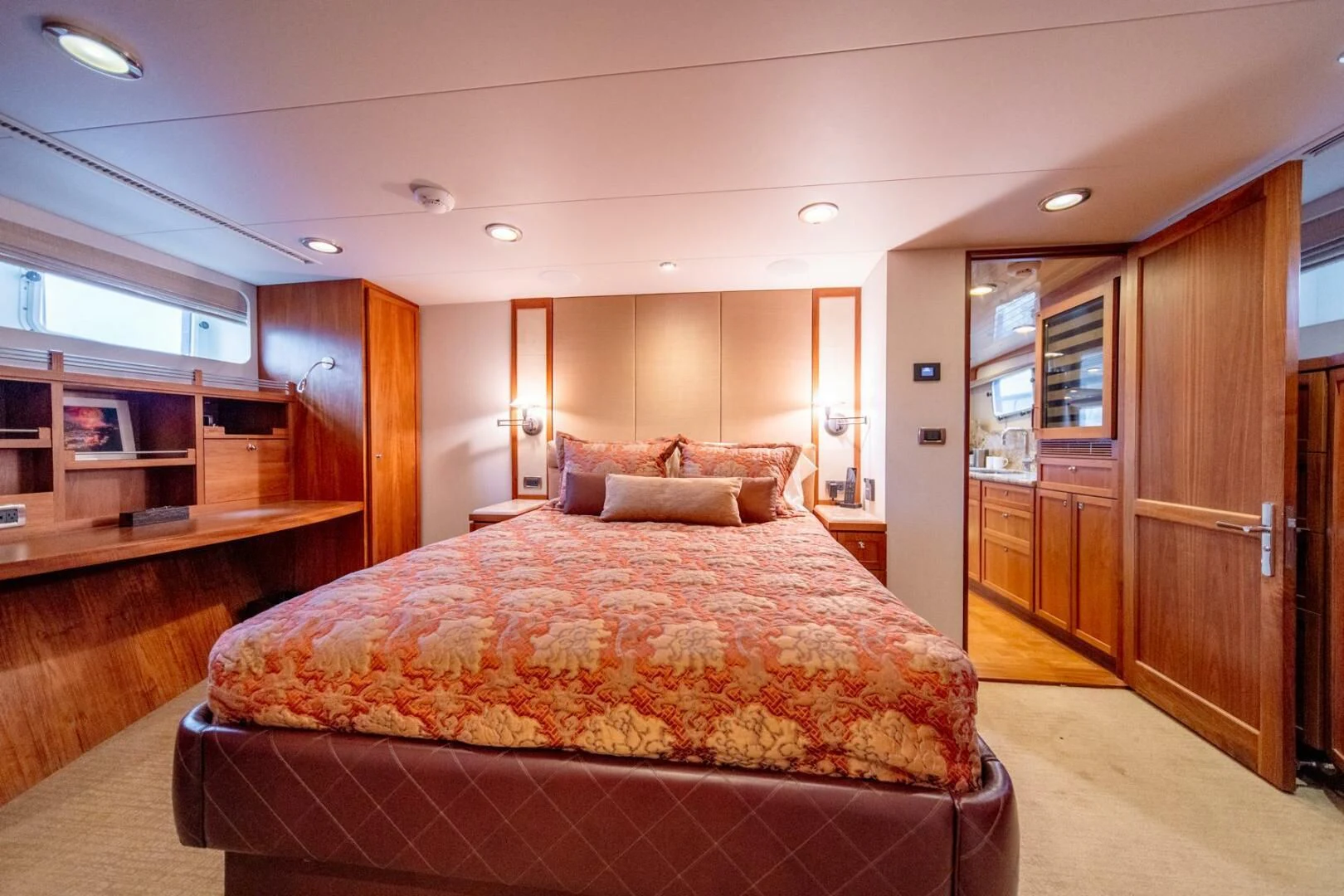 a large bedroom with a large bed aboard SEA LION Yacht for Sale