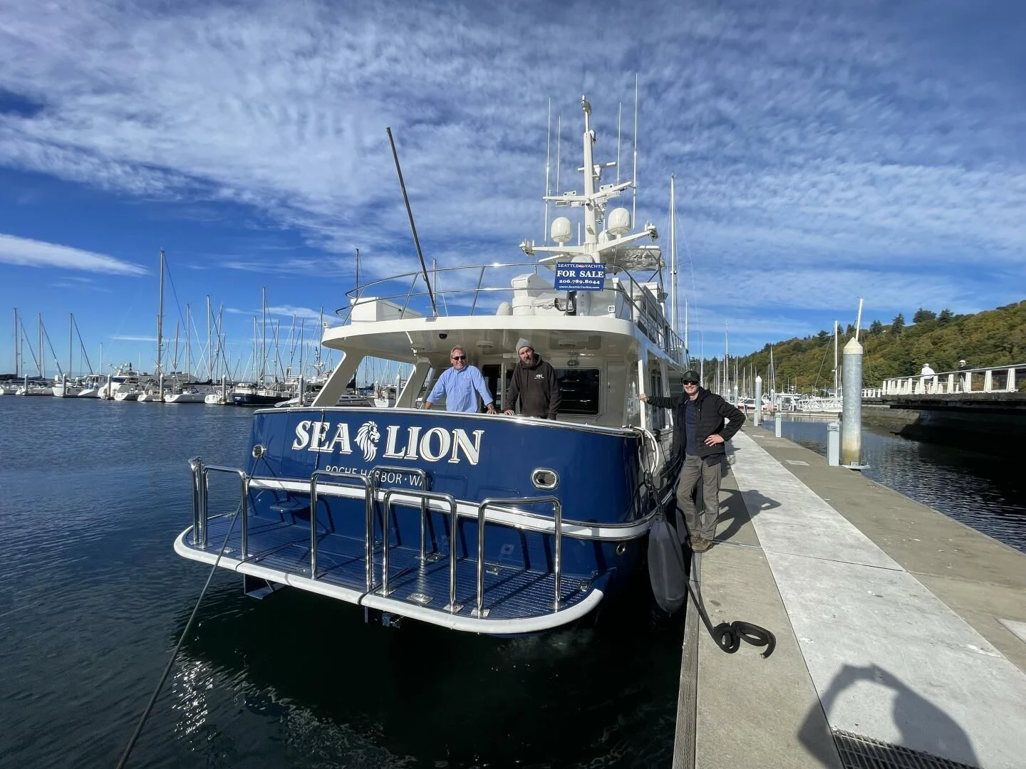 a boat docked at a pier aboard SEA LION Yacht for Sale