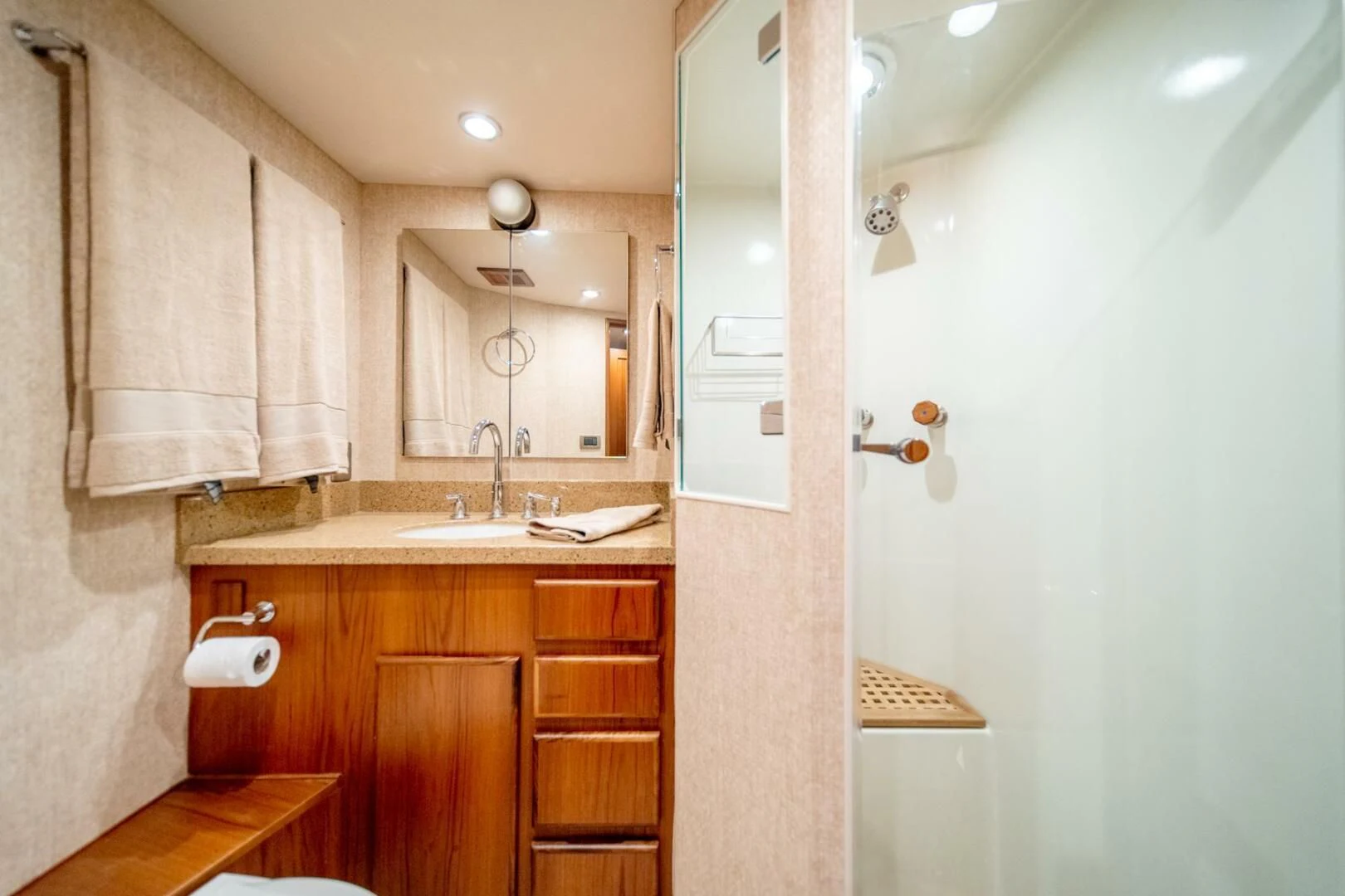 a bathroom with a sink and cabinets aboard SEA LION Yacht for Sale