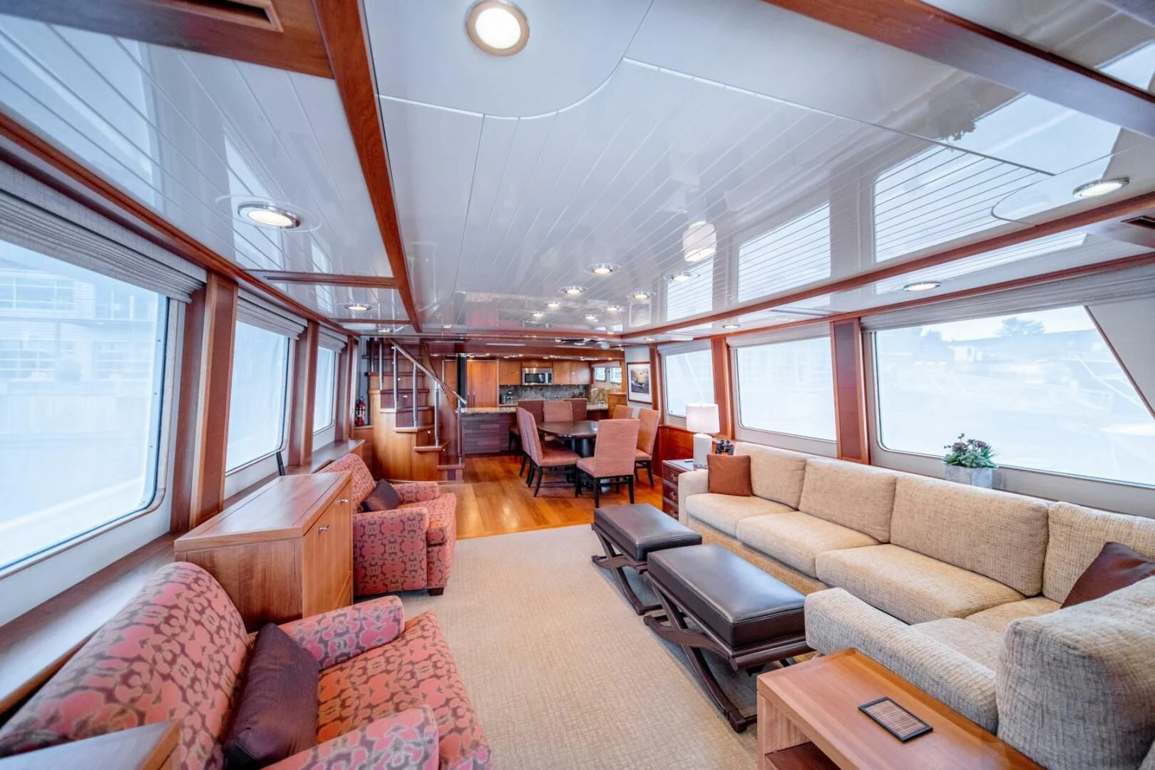 a living room with a large window aboard SEA LION Yacht for Sale