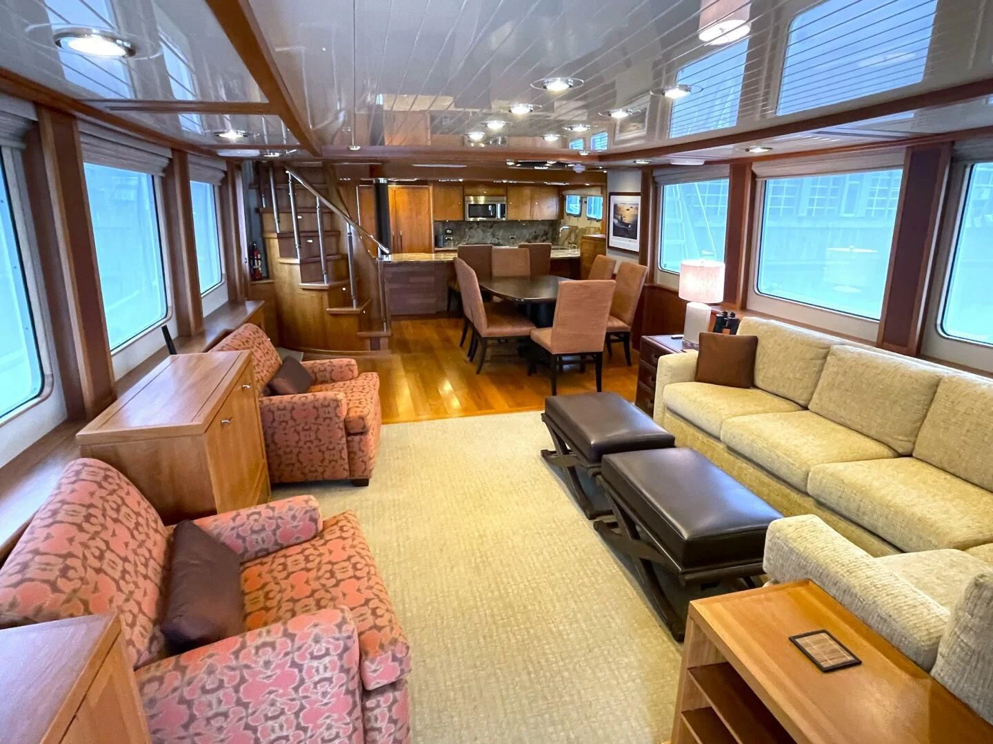 a living room with a staircase aboard SEA LION Yacht for Sale