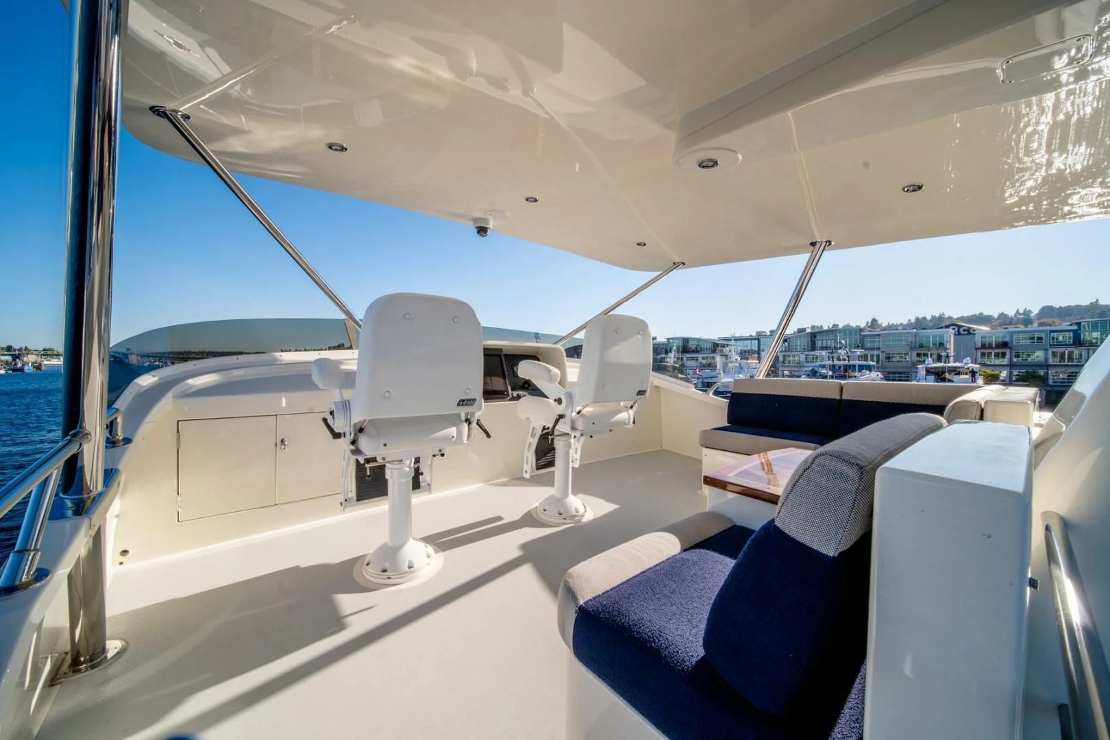 a boat with chairs on the deck aboard SEA LION Yacht for Sale